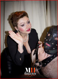 London domme slaps male slave