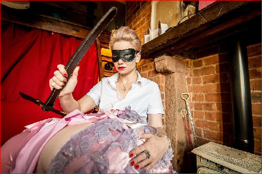 Edinburgh domme Miss Inka uses leather strap on sissy male